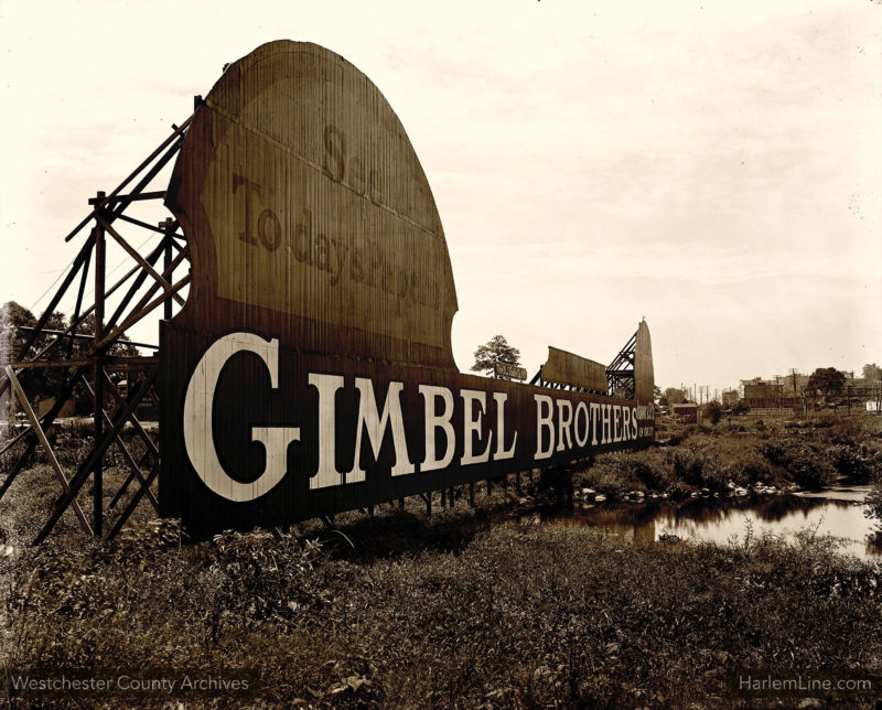 Billboards facing the railroad tracks along the Bronx River